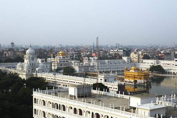 Amritsar 1 Day Tour (Golden Temple, Jallianwala Bagh, Wagah Border & Shopping) - Wagah Border ceremony: the loud finale of the day