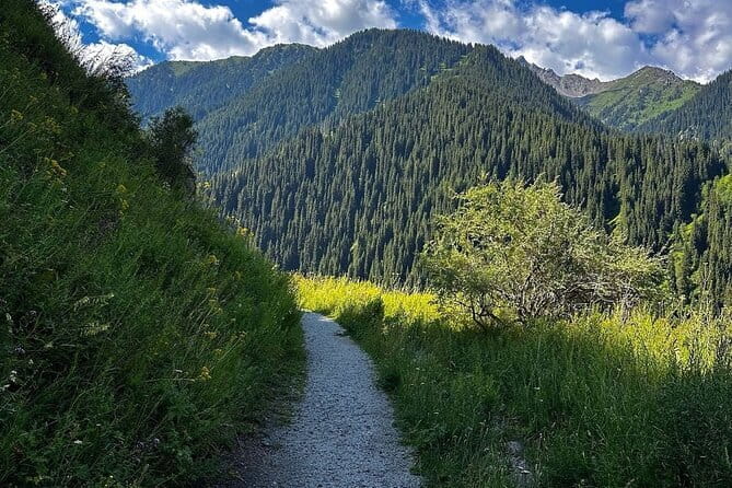 Shymbulak to Bogbanovisch Glacier and Oktabriskaya Hike - Oktyabrskaya Cave: the icy detour that changes the mood